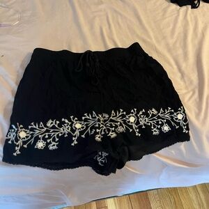Pacsun LA Hearts black shorts with a white design